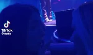 Nadia Amine kissing girlfriends in party