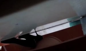 Female employee in uniform shits and farts