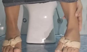 Sexy girl peeing, farting in toilet