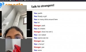 indian girl with glasses shows off