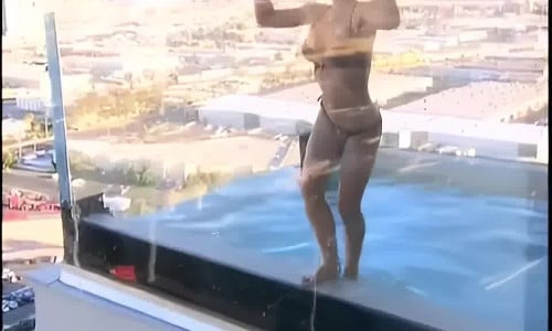 Kendra Wilkinson Dips In The Swimming Pool