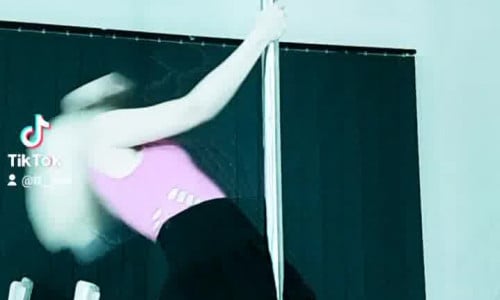 Tori dancing on a pole