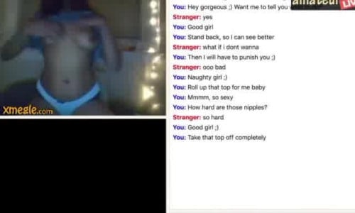 Brazilian woman with a sexy figure spreads her leg