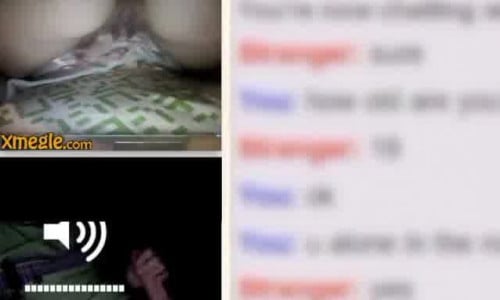 A naked girl masturbates her large labia